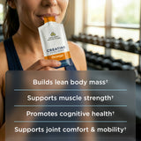 a person taking a Creatine + Collagen orange flavor gel pack