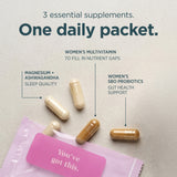 Three supplement capsules and a pink packet on a light neutral background with text reading '3 essential supplements. One daily packet.