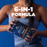 A woman in a light blue tank top holds a dark blue tub of Ancient Nutrition Multi Protein Powder. Large white text overlay reads '6-IN-1 FORMULA' against a solid blue background.