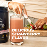 Glass of strawberry smoothie with a protein powder container, text 'Delicious Strawberry Flavor'.