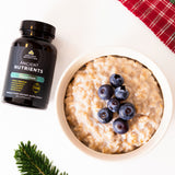 magnesium capsules next to a bowl of oatmeal