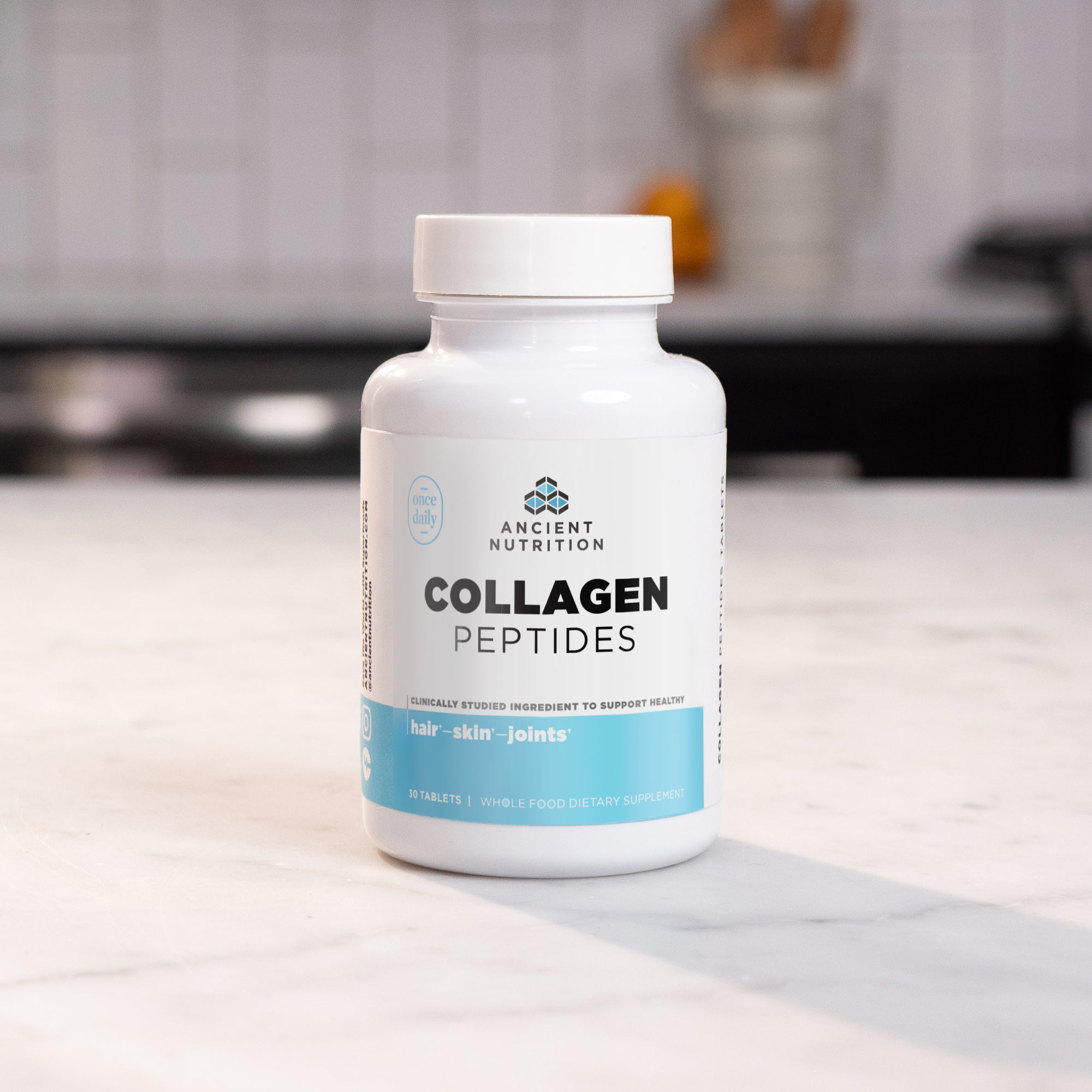 Collagen Peptides Tablets on a counter top