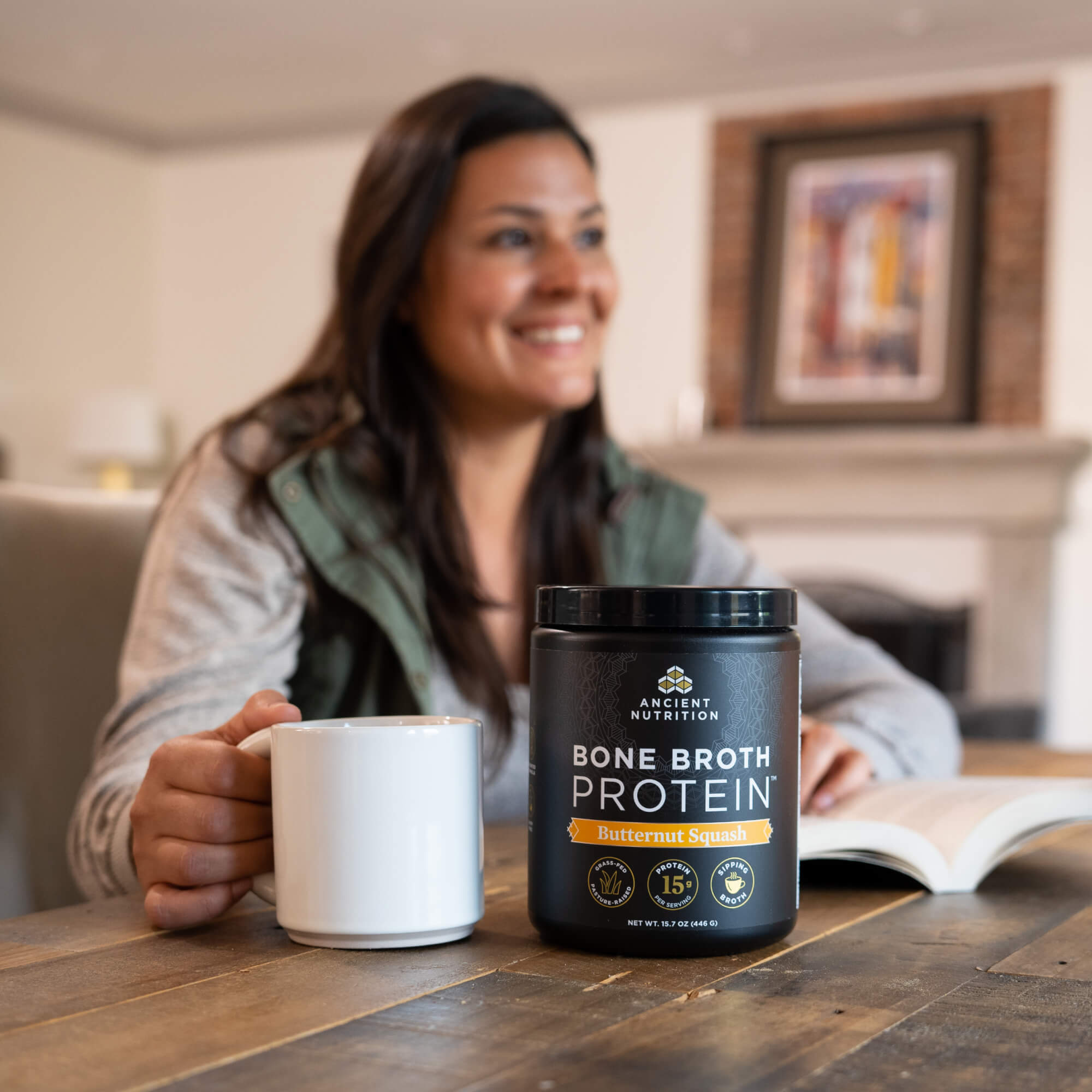 woman with a mug of bone broth protein butternut squash