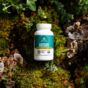 Regenerative Organic Certified™ Candida Balance on a mossy background