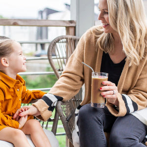 mother and daughter on porch