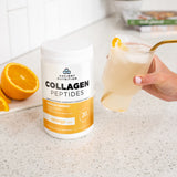 Collagen Peptides Protein Powder Immune (12 Servings) on a kitchen counter