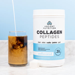a cold brew coffee in a glass cup next to a bottle of Collagen Peptides Protein Powder Unflavored (36 Servings) 