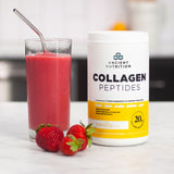 a berry smoothie next to collagen peptides vanilla 