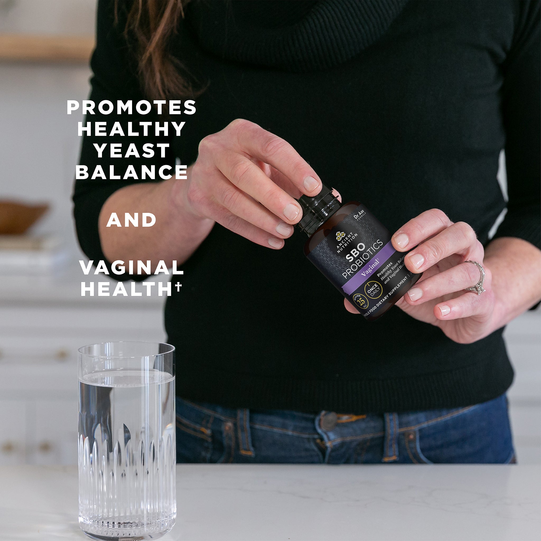 person holding SBO Probiotics Vaginal Once Daily bottle