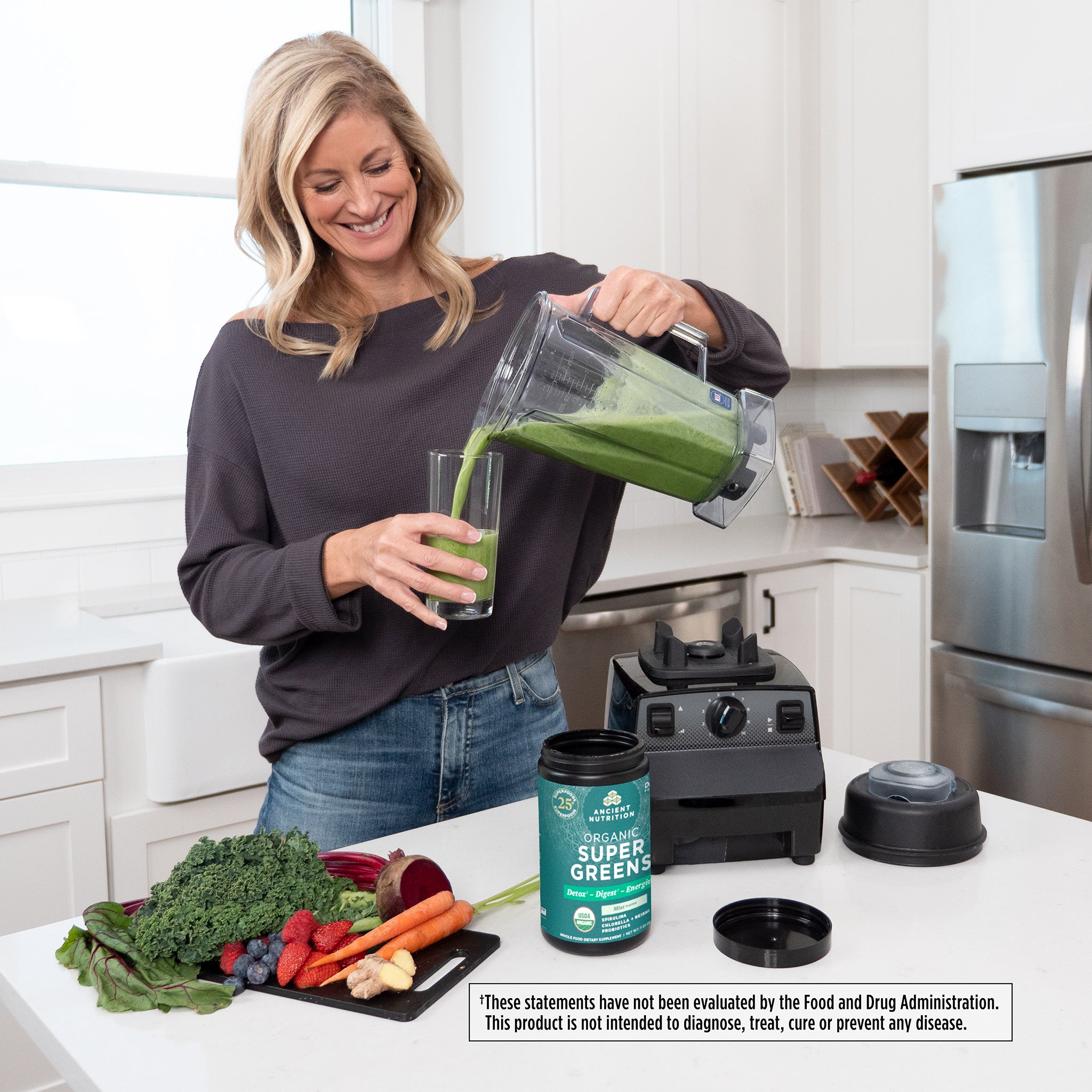 woman pouring a green smoothie