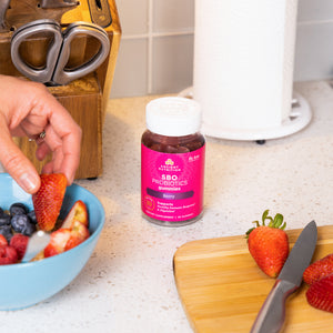 SBO Probiotics Gummies Berry - 60ct next to fruit